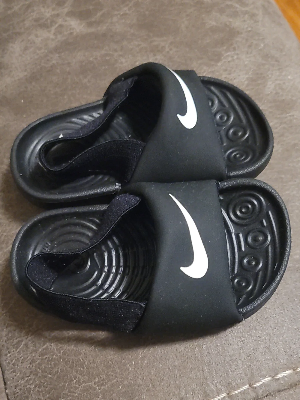 Nike Kids Black Slide Sandals with White Swoosh Accent
